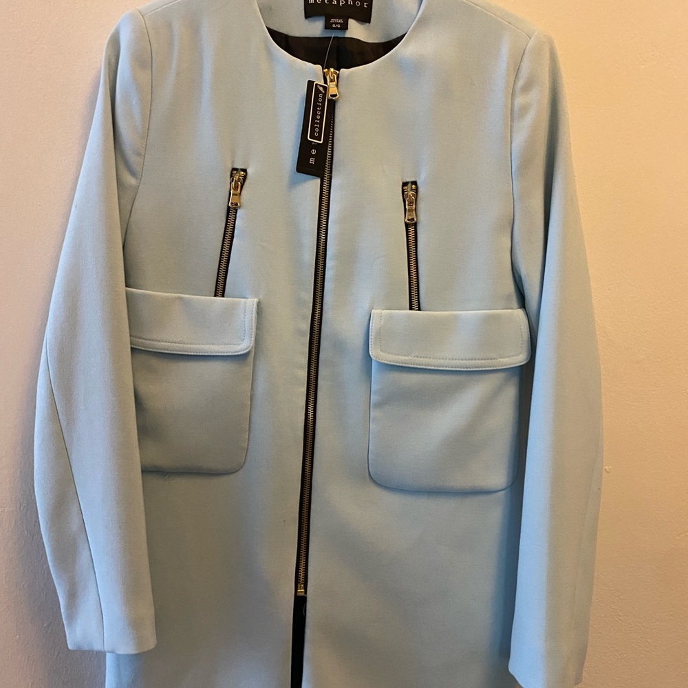 Pastel Blue jacket size: small never been used.